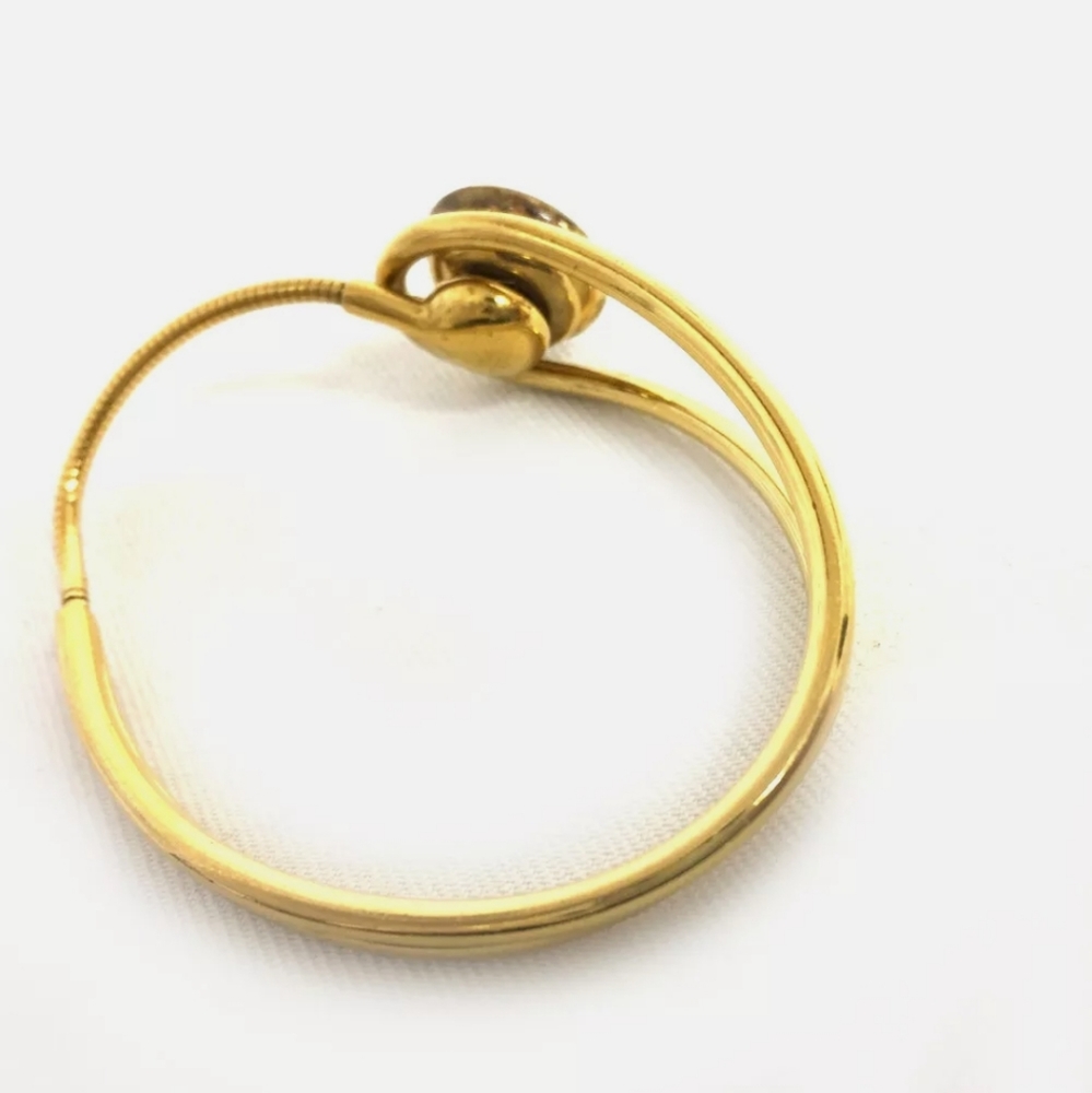 LOUIS VUITTON CELESTE MAGNET GOLD TONE BRACELET - Picture 9 of 16